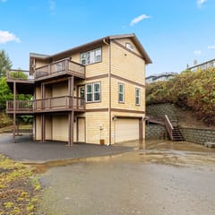 Three story ocean view home with balconies grill and open layout dog friendly