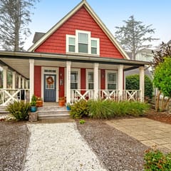 Romantic Oregon Coast Escape with Porch, Fireplace & Garden Charm