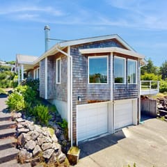 Stunning coastal home with ocean views firepit and media room walk to beach