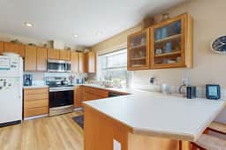 Spacious House with Ocean Views and Three Decks Close to Town and Walk to Beach