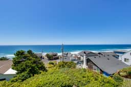 Pristine Home with Stunning Views Short Walk to Beach Right in Town