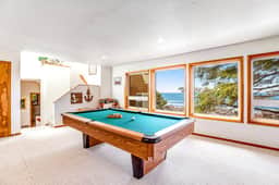 Limited Time Deals Coastal Hideaway with Ocean Views and Spacious Deck
