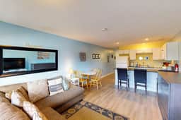Creekside condo with beach access balcony full kitchen and ocean views