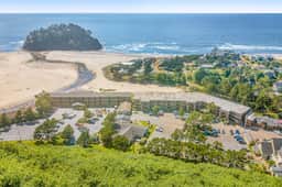 Cozy Coastal Condo Steps from the Beach with Deck Views