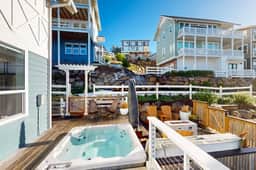 Beautiful family friendly home with private hot tub walk to beach shared pool