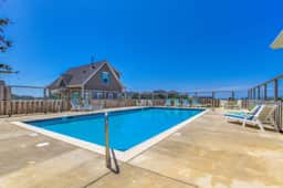 Beautiful family friendly home with private hot tub walk to beach shared pool