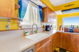 Two story beach house with an ocean view furnished deck and washer dryer