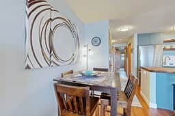 Beachfront condo boasting beautiful views a private balcony and perfect location