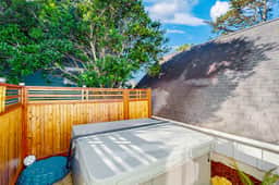 Family friendly home close to ocean private hot tub fireplace and WIFI
