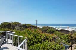 Renovated lake ocean view retreat with hot tub outdoor living and fireplace