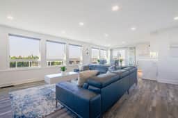 Renovated lake ocean view retreat with hot tub outdoor living and fireplace