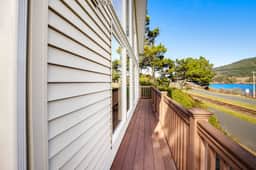 Lake view getaway steps from beach with WiFi and private washer dryer