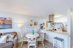 Rock Creek Inn condo on beach with ocean view balcony walk to shops and dining