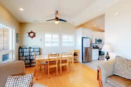 Beachfront home with ocean facing deck and ocean views throughout modern kitchen