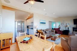 Beachfront home with ocean facing deck and ocean views throughout modern kitchen