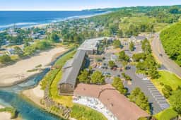 Creekfront Condo with Private Patio Beach Access Shared with D Gas Grill and Views