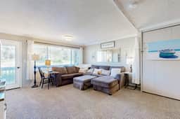 Creekfront Condo with Private Patio Beach Access Shared with D Gas Grill and Views - Image 4