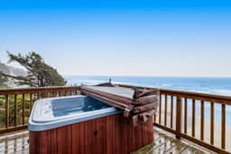 Beachfront Dog Friendly Cottage with Private Hot Tub Fireplace and Ocean Views
