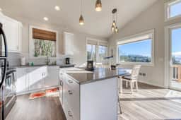 Contemporary built dog friendly house with partial ocean views