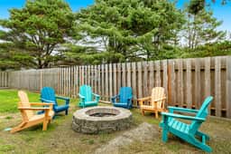 Dog friendly home across street from beach with rooftop deck and views