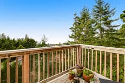 Dog friendly home with ocean views deck washer dryer grill and fireplace