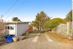 Cottage with wraparound deck and ocean views close to beach and town dog friendly