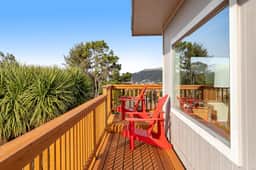 Cottage with wraparound deck and ocean views close to beach and town dog friendly