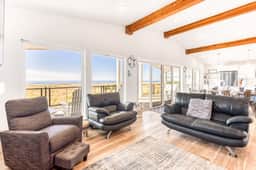 Beautiful beachfront home with huge ocean view beach access and large deck