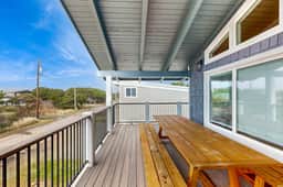 Renovated home near beach access with two kitchens and fireplace dog friendly