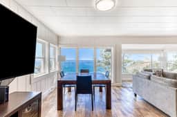 Spacious ocean view home with wood fireplace grill and deck dog friendly