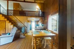 Charming dog friendly getaway with a full kitchen and firepit walk to the beach