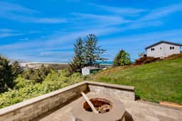 Ocean view home with heated floors private hot tub and multiple decks