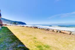 Oceanfront Condo with Sweeping Views and Beach Access