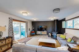 Coastal Paradise Awaits Spacious Retreat with Firepit and Entertainment
