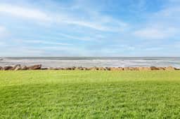 Oceanfront ground level condo with fireplace and updated kitchen dog friendly