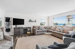 Dog friendly ocean view home with deck and enclosed yard 1 block to beach