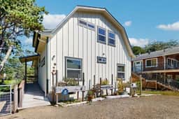 Newly constructed home with firepit and large deck walk to the beach and golf
