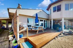 Dog friendly oceanfront house with sweeping ocean views and wood burning fireplace