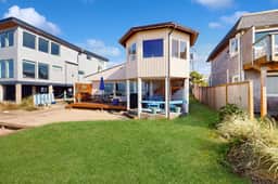 Dog friendly oceanfront house with sweeping ocean views and wood burning fireplace