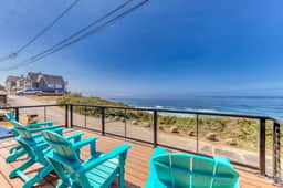 Oceanfront dog friendly home with hot tub and huge view steps to beach access