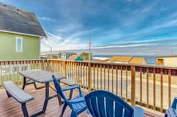 Ocean view home 1 block from the beach with hot tub deck and fireplace