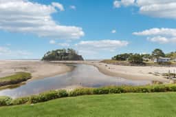Dog friendly oceanfront condo with beach access and Proposal Rock view