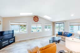 Homey dog friendly house with partial ocean views gas fireplaces and gas grill