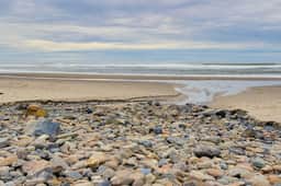 Upper Level Condo with Private Balcony and Nearby Beach Access Dog Friendly