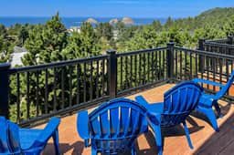 Sweeping ocean view home with fireplace grill and foosball table dog friendly