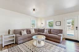 Modern Beach Cottage with a covered patio fire pit grill and easy beach access