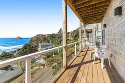 Remodeled home with multiple decks and ocean views short walk to beach