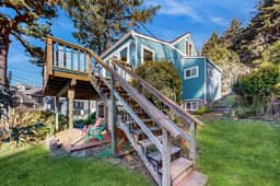 Charming home with wonderful ocean views ping pong game room WiFi decks