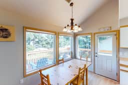 Bright dog friendly home with wrap around deck just steps from beach