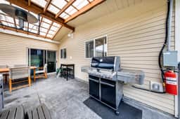 Snazzy home near the beach with private hot tub patio and grill